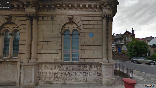 Blue plaque on a building