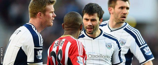 Jermain Defoe and Claudio Yacob