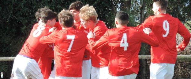 Jersey celebrate their goal