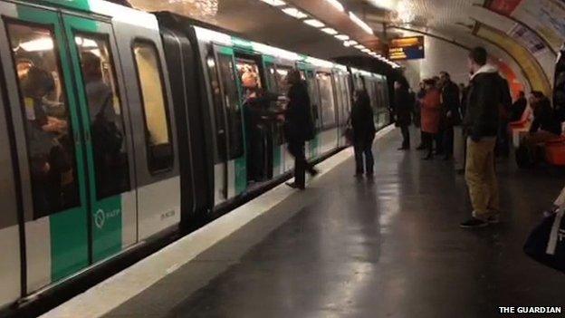 Man being pushed off a Metro carriage