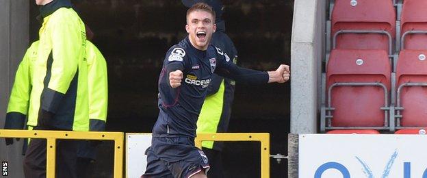 Marcus Fraser celebrates after scoring for Ross County against Partick Thistle