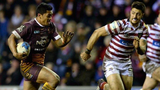 Anthony Milford races away from Anthony Gelling