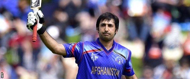 Afghanistan batsman Asghar Stanikzai celebrates 50 runs