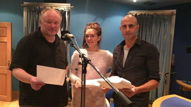 Bjarne Henriksen, Vanessa Kirby and Mark Strong during the recording of Victory