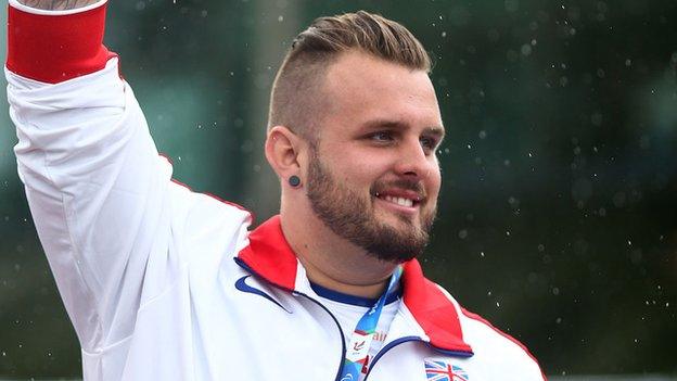 Aled Davies holds world records in both shot put and discus