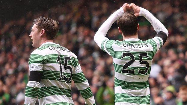 Kris Commons and Stefan Johansen celebrate