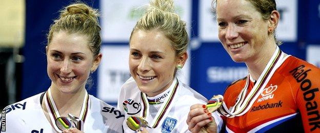 Britain's Laura Trott ( L), winner Annette Edmondson of Australia (C) and second placed Netherlands' Kirsten Wild