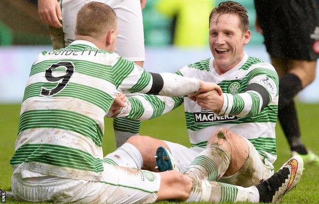 John Guidetti and Kris Commons celebrate