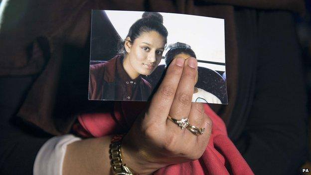 Renu, eldest sister of missing British girl Shamima Begum, holds a picture of her sister