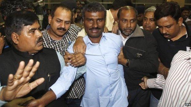 Indian Jesuit priest, Father Alexis Prem Kumar (C), arrives after his release from captivity by unidentified gunmen in Afghanistan, at the Indira Gandhi International airport, New Delhi, India, 22 February 2015. A