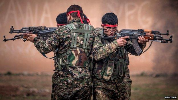 YPG fighters at a training camp in Ras al-Ain, Syria