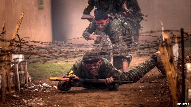 YPG fighters at a training camp in Ras al-Ain, Syria