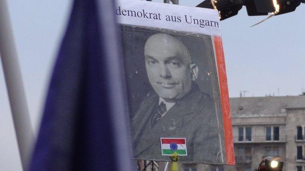 A poster of Viktor Orban mocked up as Hungarian Communist leader Matyas Rakosi