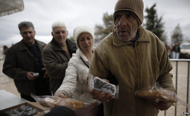 Handout of olives and bread in Athens (23 Feb)