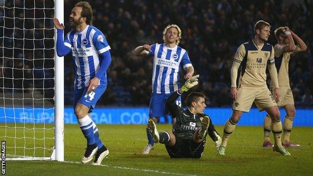 Brighton's Inigo Calderon celebrates against Leeds