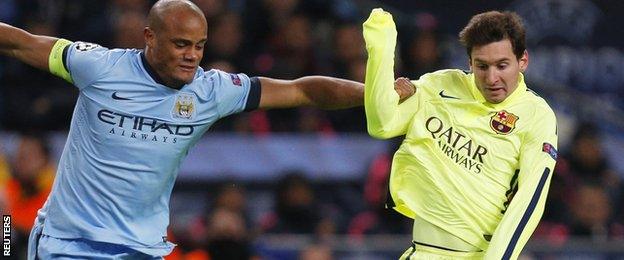 Vincent Kompany and Luis Suarez