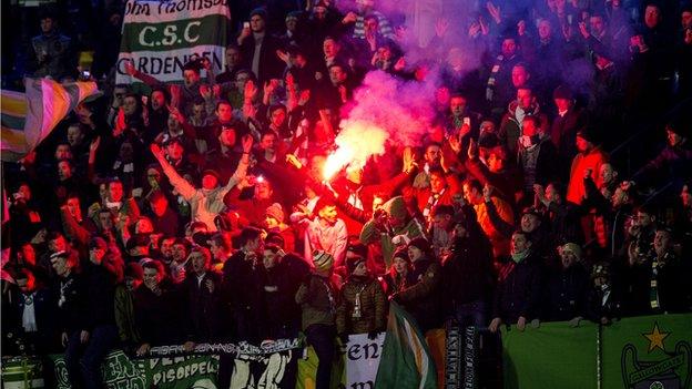 Flares are set off in the Celtic section in Zagreb