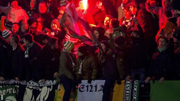 Flares are set off in the Celtic section in Zagreb