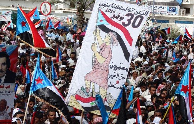 Separatists march in the Yemeni city of Aden, demanding independence for the South. The banner reads: "We will continue until liberation and independence."