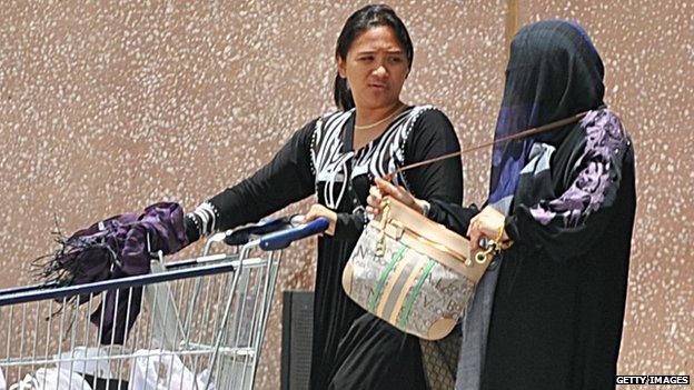 A Filipina maid and her Saudi employer