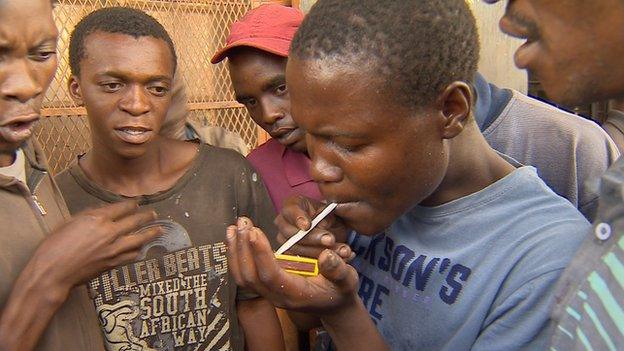 A young man smokes nyaope in Delmas, Mpumalanga