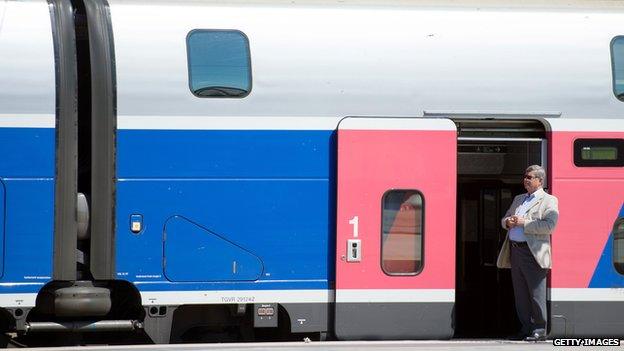 A man waits on a platform at the Saint-Charles railway station, France