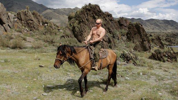 A bare-chested Russian Prime Minister Vladimir Putin rides a horse during his vacation outside the town of Kyzyl, in southern Siberia, on 3 August 2009.