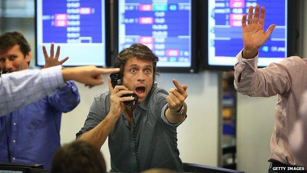 Stockbrokers shouting on the phone