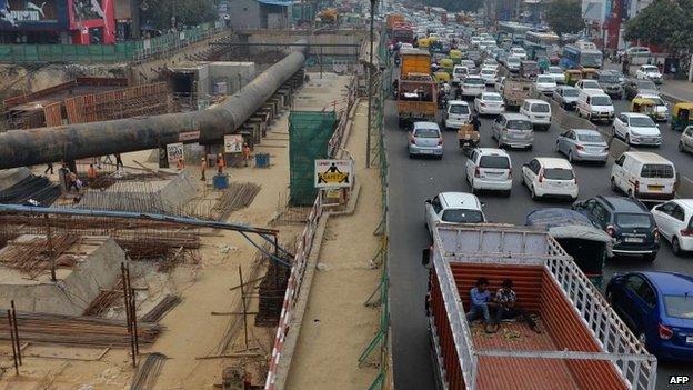 In this photograph taken on February 24, 2015, employees of the Indian Delhi Metro Rail Corporation (DMRC) work on the construction of a tunnel in New Delhi.