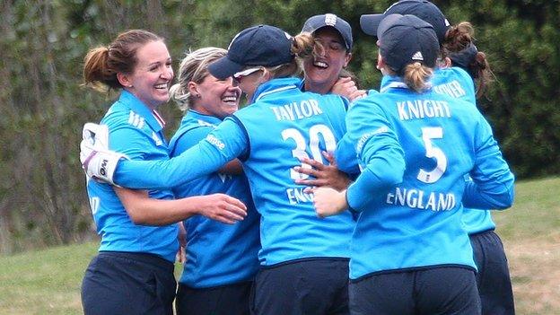 England celebrate a wicket