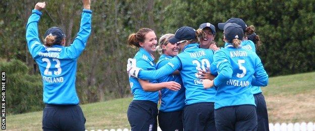 England celebrate a wicket