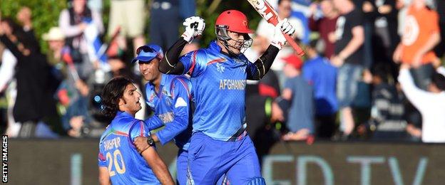 Hamid Hassan and Shapoor Zadran celebrate Afghanistan's win