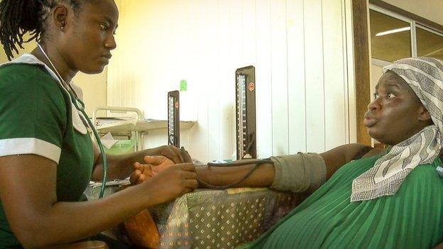 Salma Razak (left) a nurse at Korle Bu Hospital in Accra, Ghana