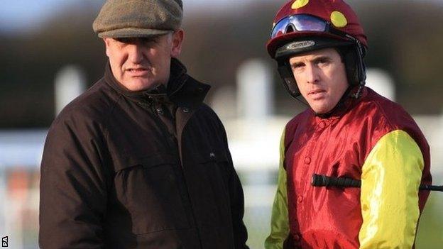 Jason Maguire (right) with trainer Donald McCain