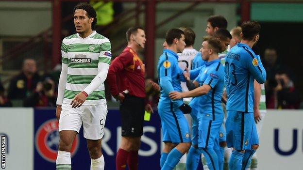 Virgil van Dijk walks off after being red carded at the San Siro