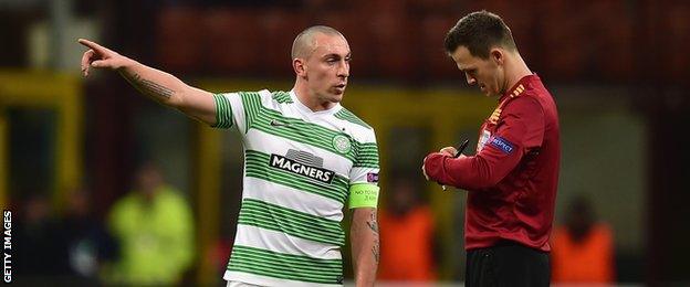 Celtic captain Scott Brown and Slovakian referee Ivan Kruzliak