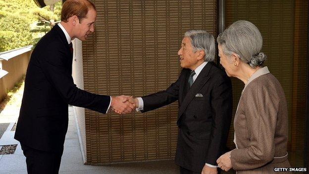 The Duke of Cambridge shakes hands with Japanese Emperor Akihito