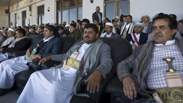 President of the Supreme Revolutionary Committee, Mohammed Ali al-Houthi (centre) attends a rally in support of the Houthis at a sports stadium in Sanaa, Yemen (7 February 2015)