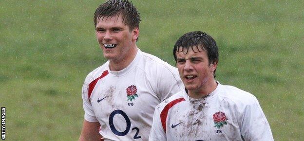 Owen Farrell (L) of England looks on with team mate George Ford during the Under-18 match between England and Western Province at Rondebosch Boys School in August 2009 in Cape Town