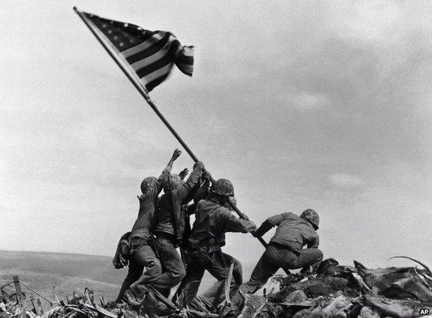 US marines raising the American flag on Iwo Jima