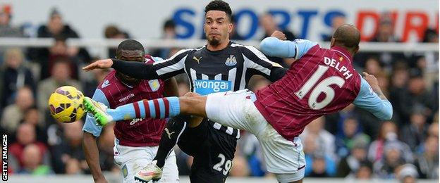 Fabian Delph in action against Emmanuel Rivière