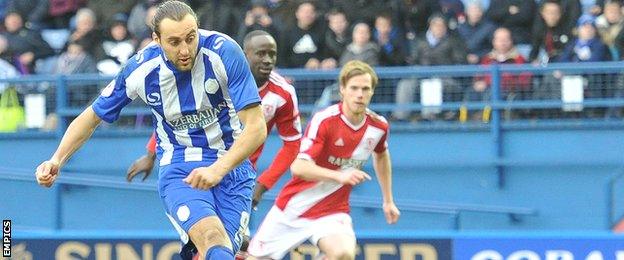 Atdhe Nuhiu takes the penalty for Sheffield Wednesday