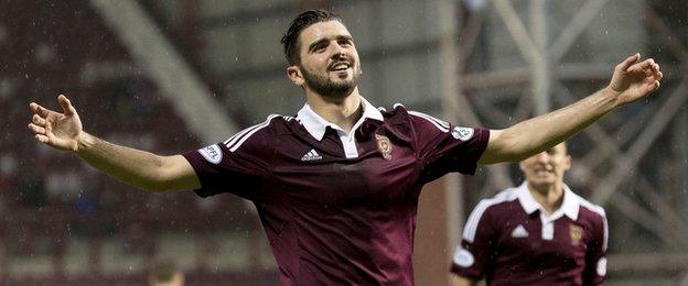 Hearts defender Alim Ozturk celebrates after scoring against Cowdenbeath