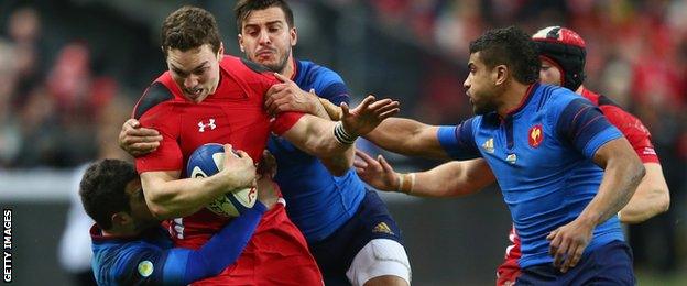 George North is tackled by Brice Dulin