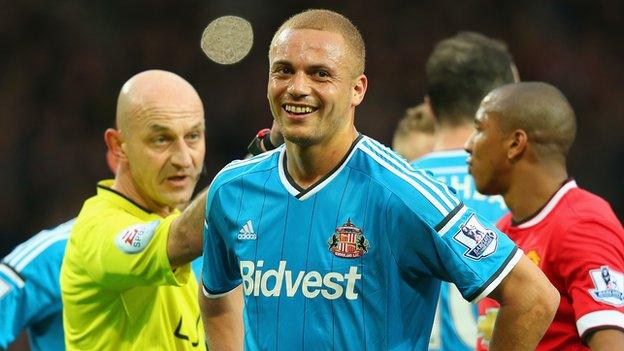 Sunderland defender Wes Brown (right) shows his dismay at being sent off by referee Roger East