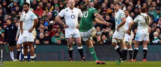 Ireland's fly half Johnny Sexton kicks a penalty