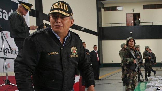 Minister Daniel Urresti talks with the press during the presentation of seized drugs at a police base in Lima, Peru. file photo Sept 21 2014