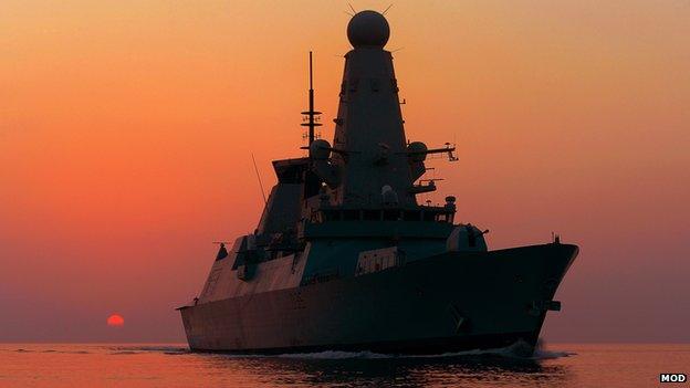 Type 45 destroyer HMS Dragon at sunset during her patrol in the Middle East in 2013.