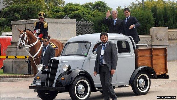 Tabare Vazquez and Raul Sendic wave to supporters in Montevideo on 1 March 2015