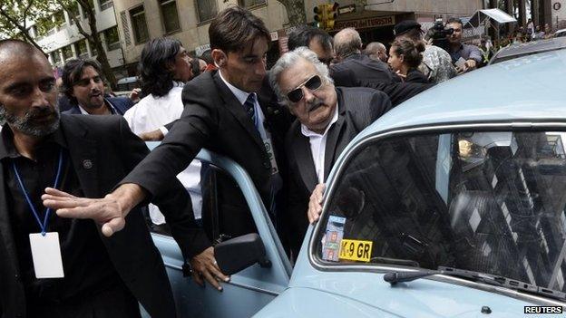 Jose Mujica gets into his Volkswagen Beetle after handing over the presidential sash to Tabare Vazquez in Montevideo on 1 March, 2015.